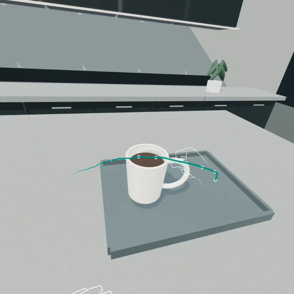 Frame from the Quest recording: the mug has been placed on the tray, with tracked hand movement trails visible